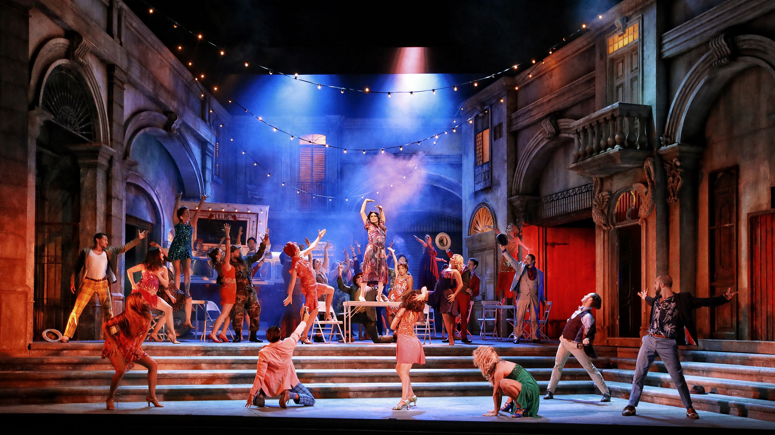 A dancing scene from Opera Australia's 2018 production of Carmen at the Sydney Opera House