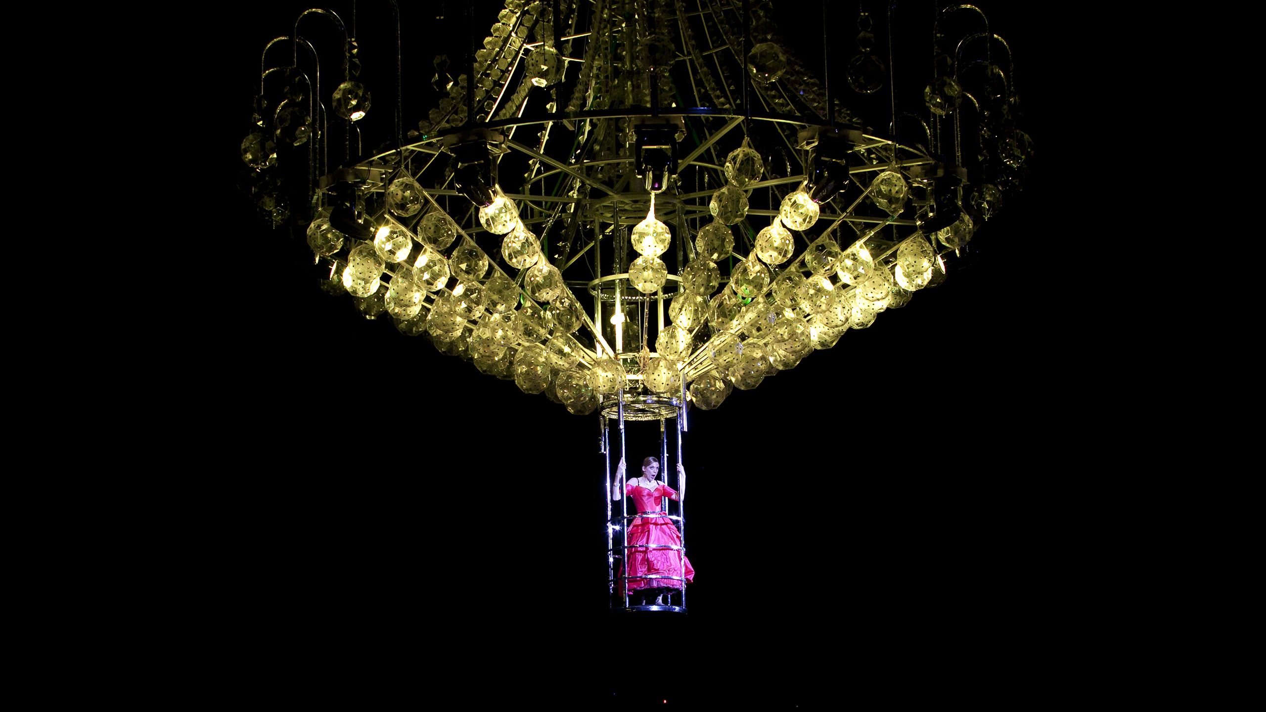 Rachelle Durkin in a giant chandelier in La Traviata on Sydney Harbour